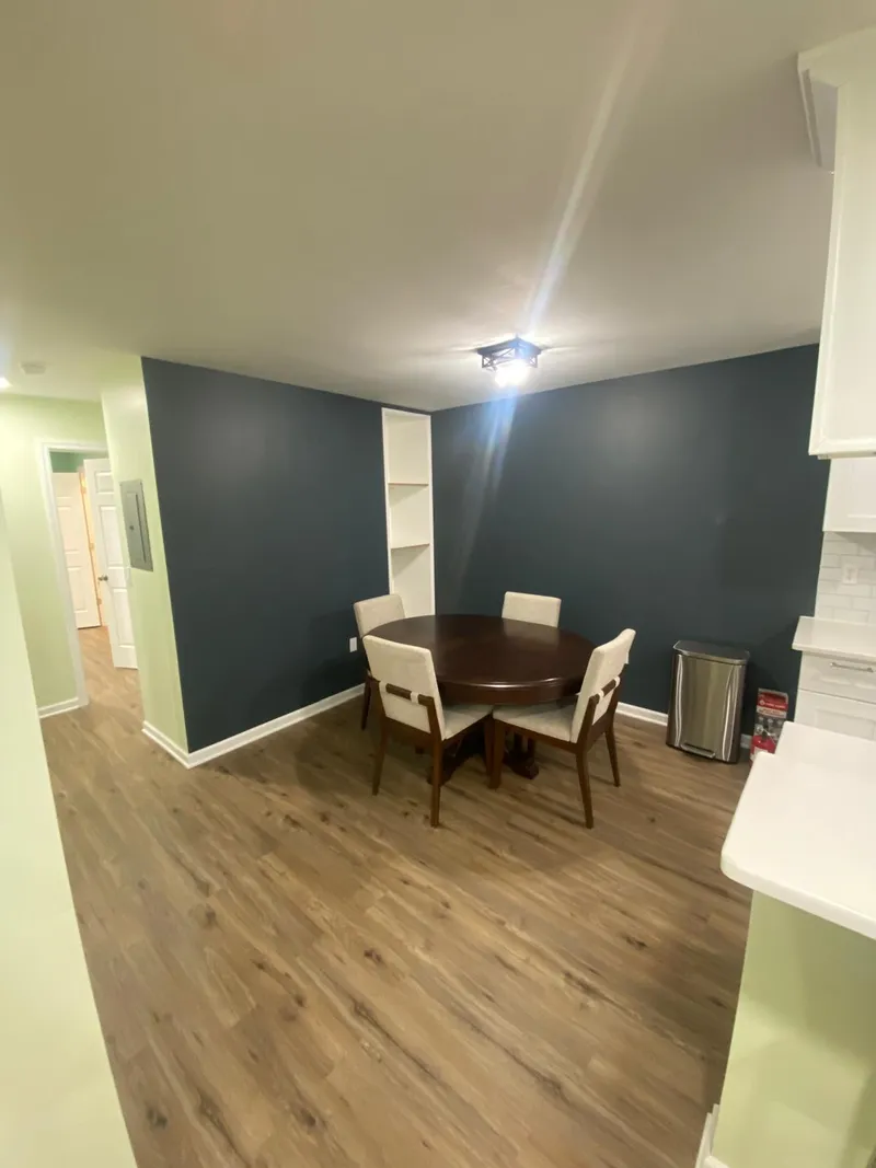 Full room remodel with new flooring, painting, trim.